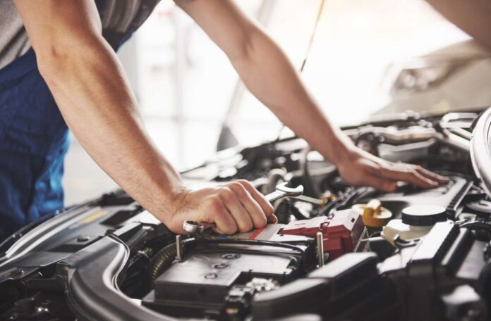 auto-mechanic-working-garage-repair-service.jpg